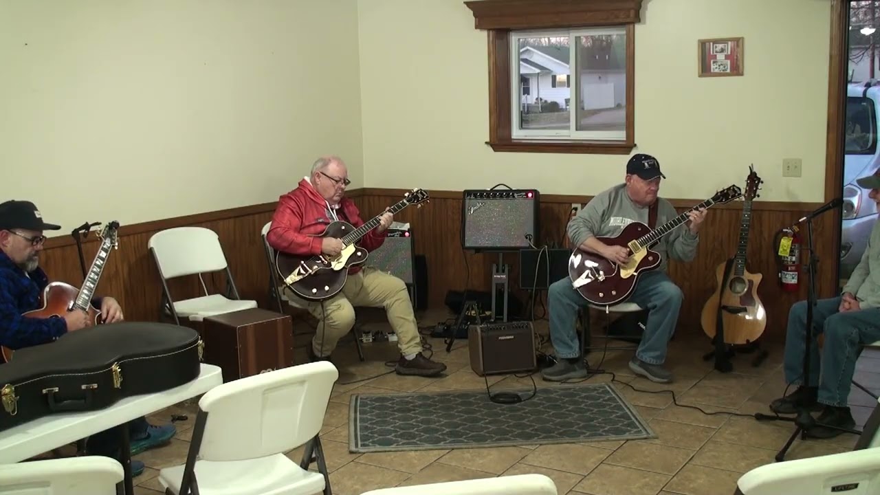 Chris Waddell, Larry Stone and Paul Moseley with Dickie Morris singing  