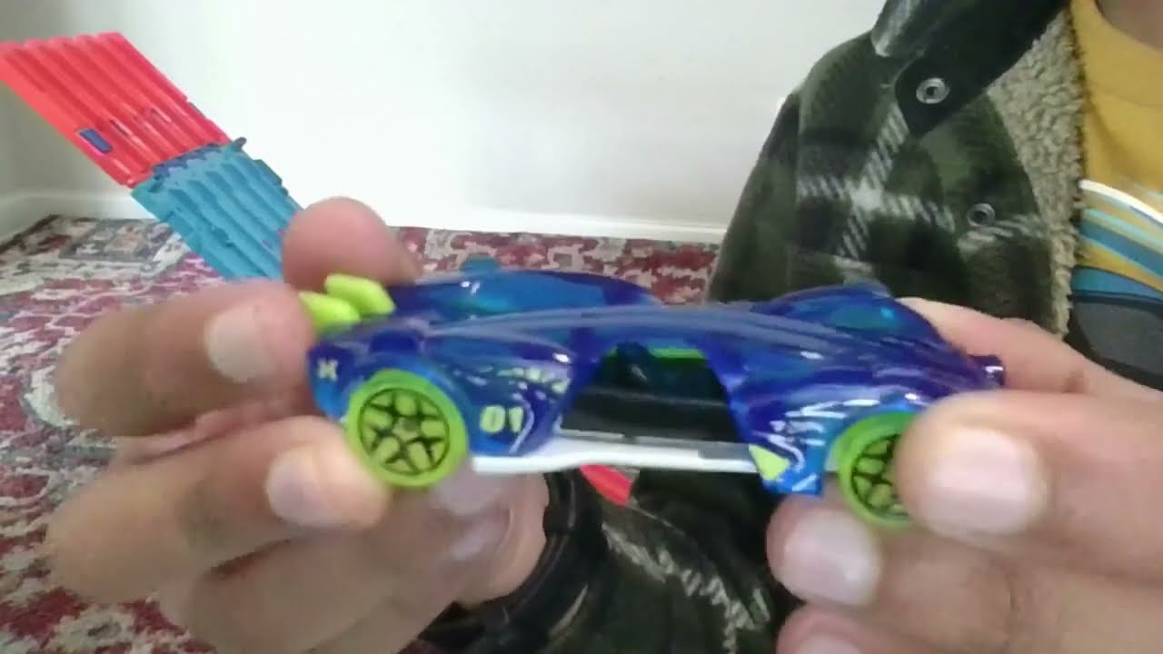 playing hot wheels and try to guess which car wins