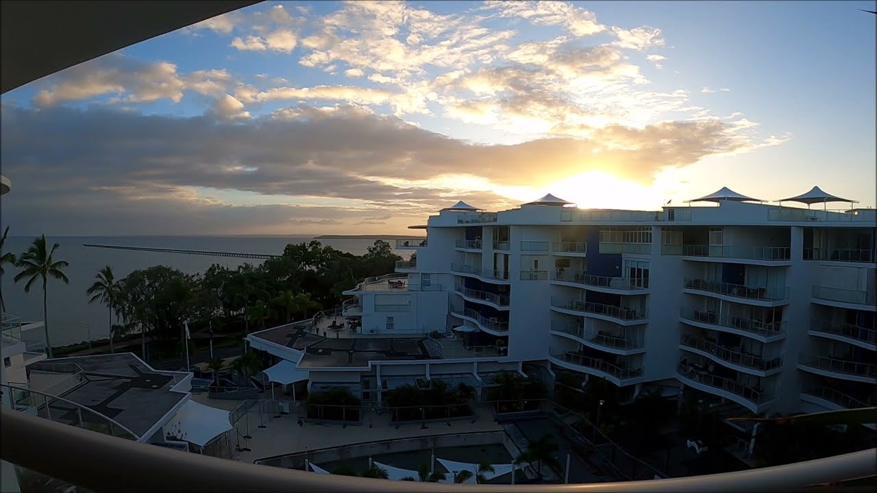 A Stunning Early Morning Sunrise at Oaks Resort Balcony in Urangan, QLD, Australia