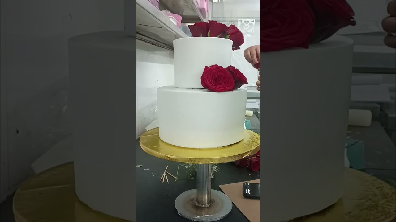 K afroj ali creator  2 kilo choco chips just engage cake beautiful design real rose##