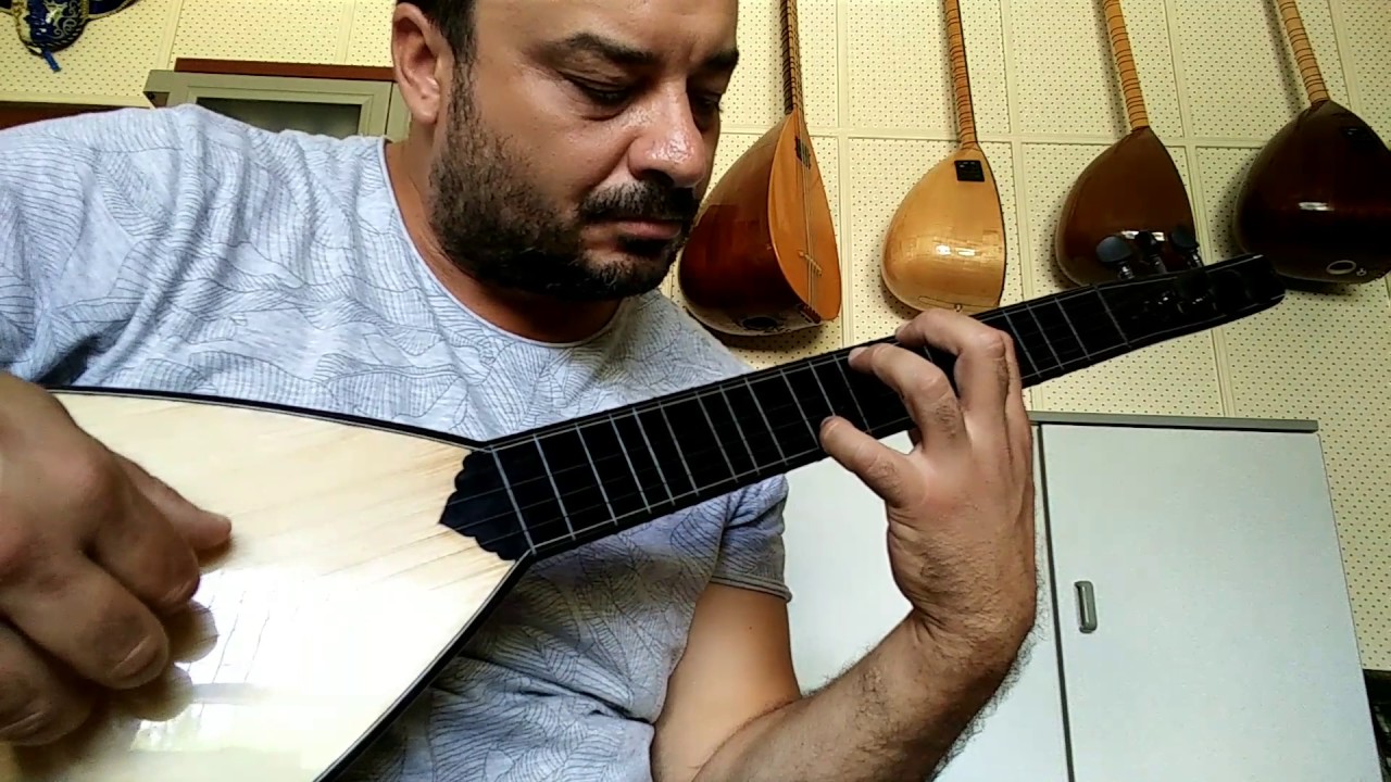 &Ouml;zg&uuml;r Peker Oğur Sazı Benim sadık yarim kara topraktır.