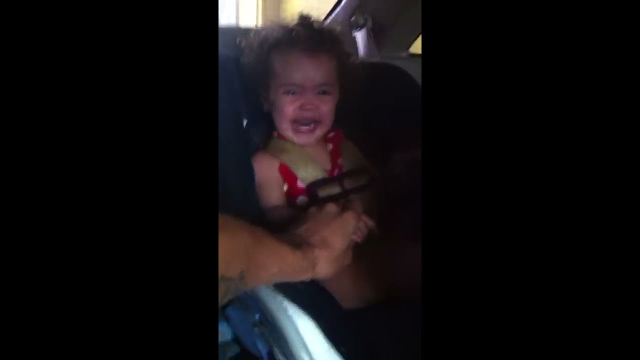 Baby scared shitless in drive thru carwash