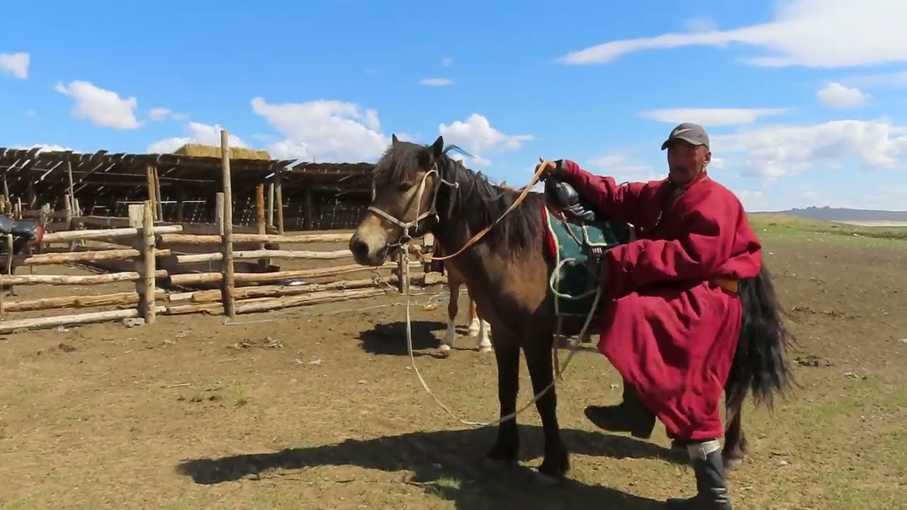 Paagaa trying my horse, Burd, Mongolia