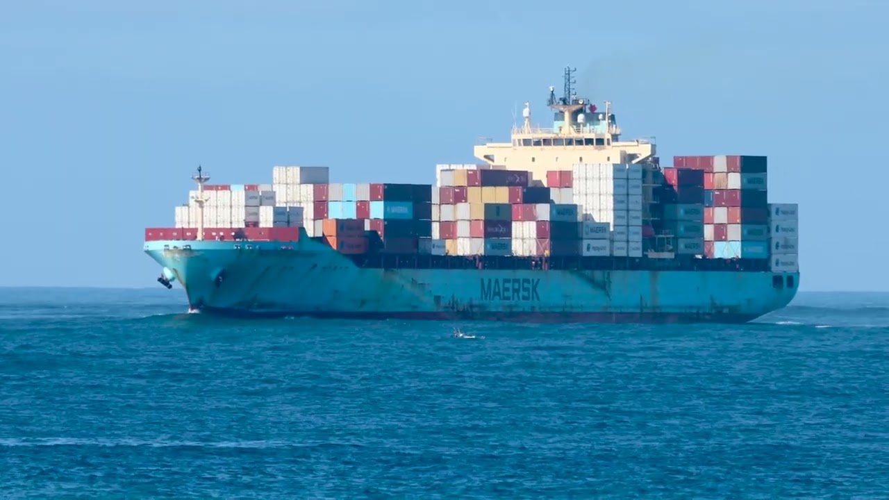 Three ships and the water police patrol the fairway to clear it at  Point Lonsdale, Vic, Australia.