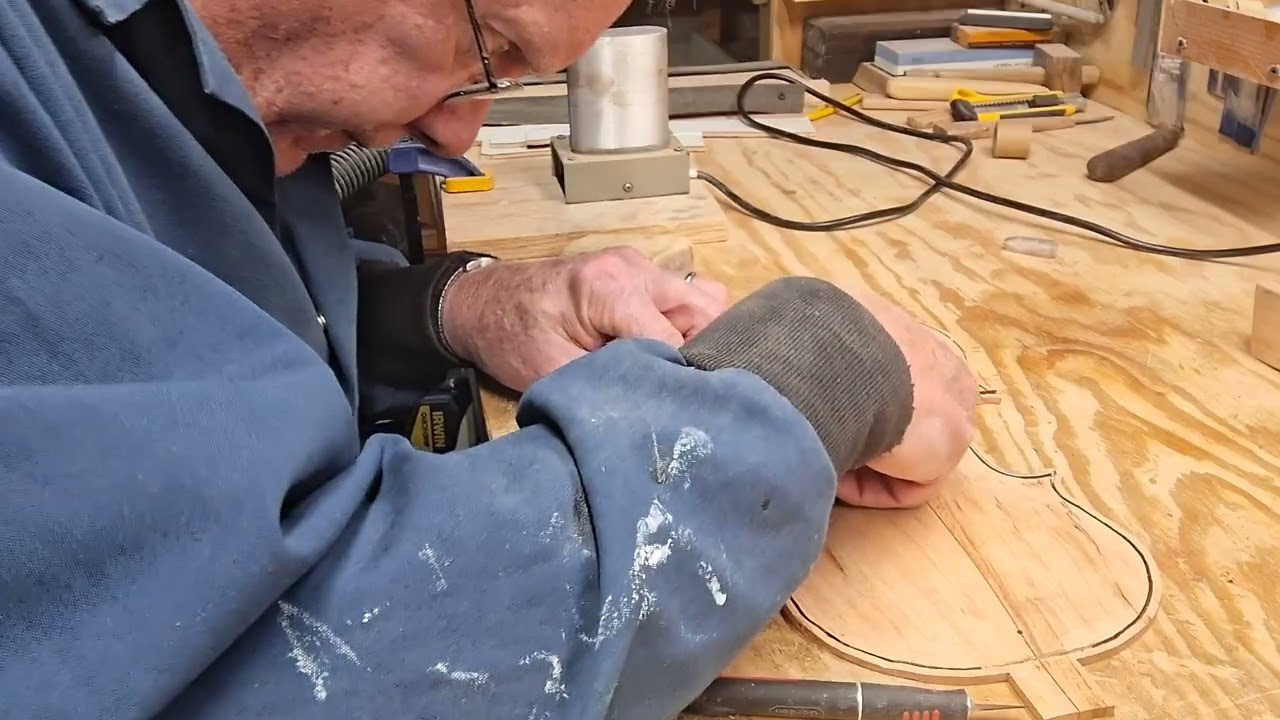Bending and fitting the purfling. Subscribe and watch the Cherry violin come alive.