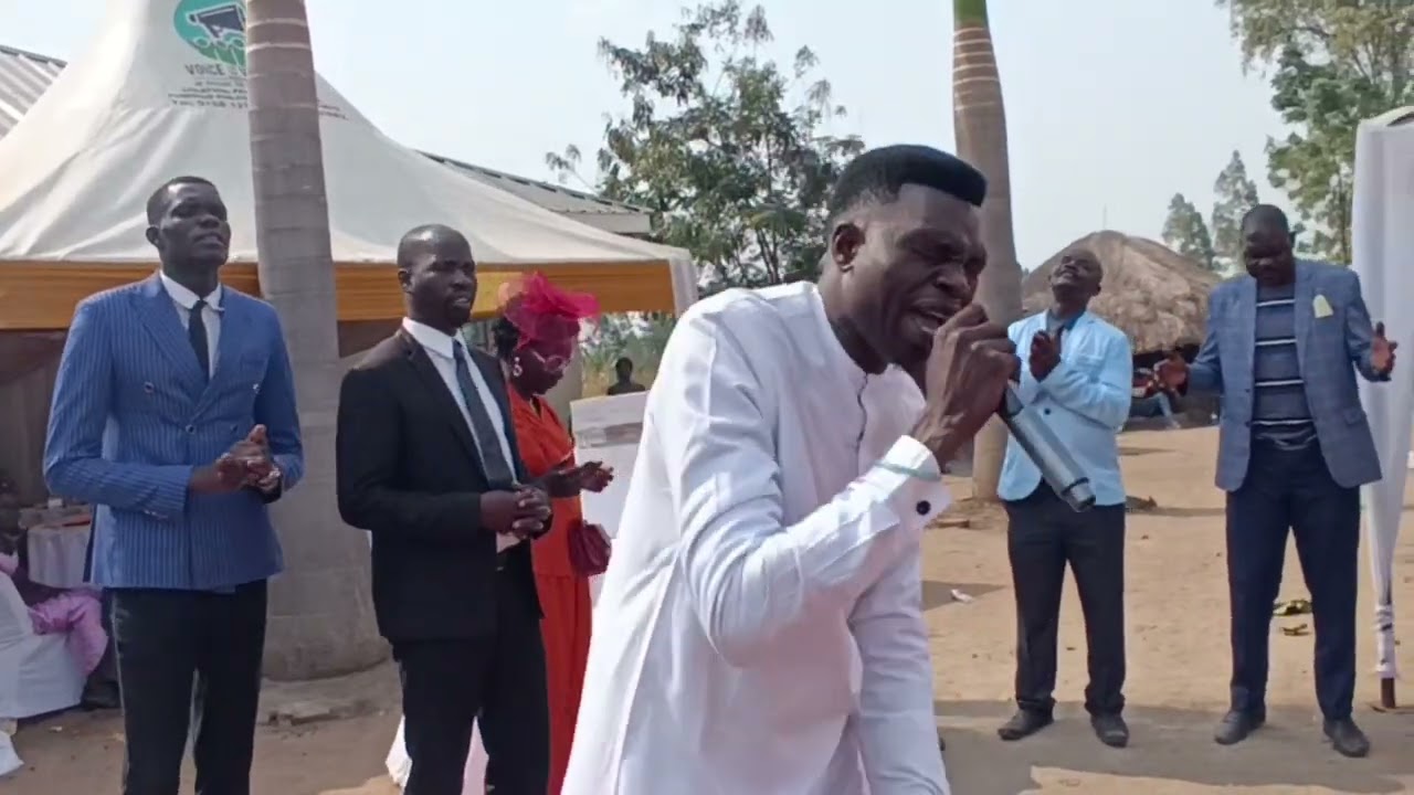 Pastor David okello from Omega fire ministry kampala.he felt down when singing this worship song.
