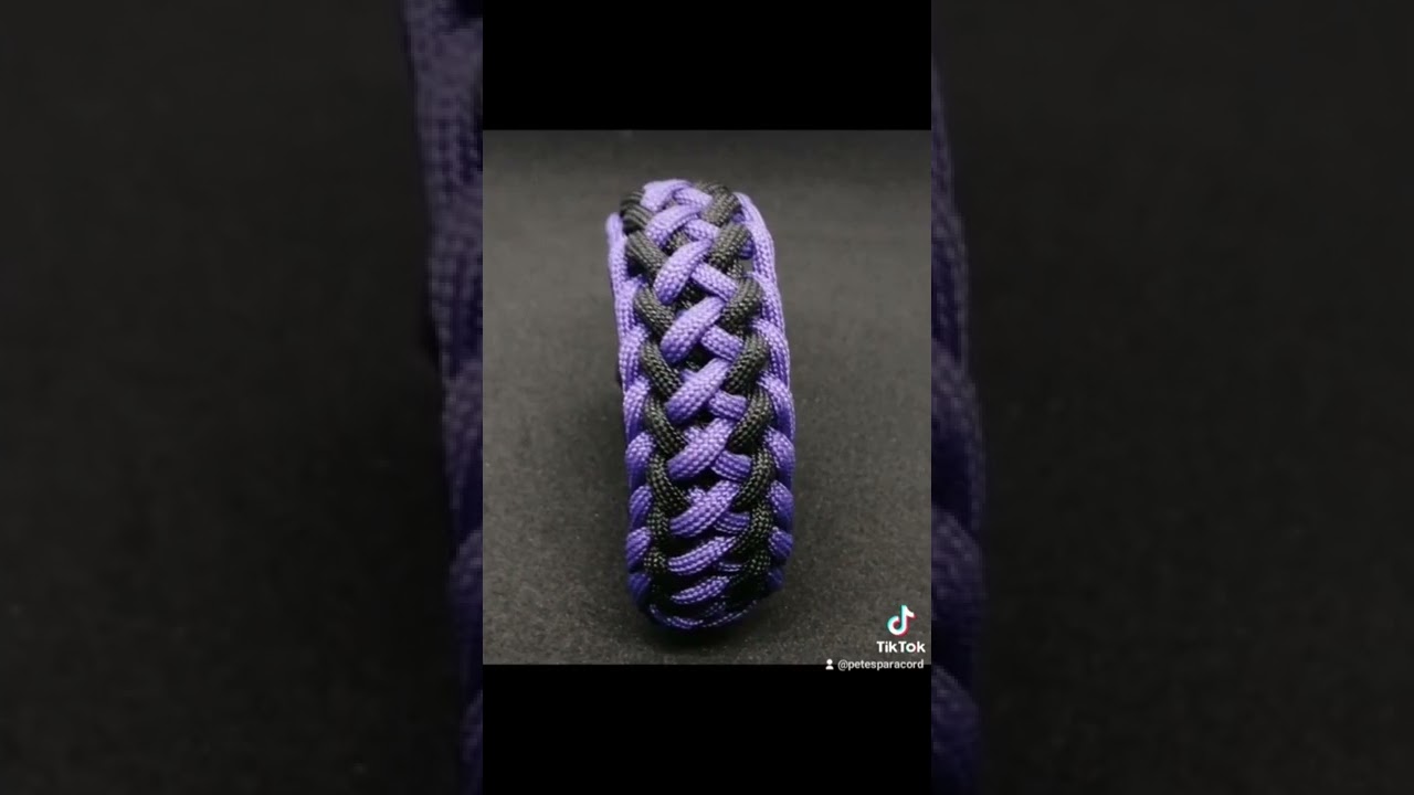 Grin of the wolf paracord braclet with buckle closure.
