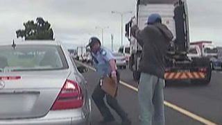 Officer shot at point-blank range during traffic stop