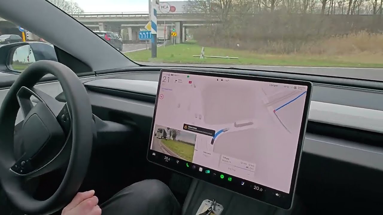 FSD (supervised) A58 invoegen Tilburg richting Breda in een Tesla Model 3