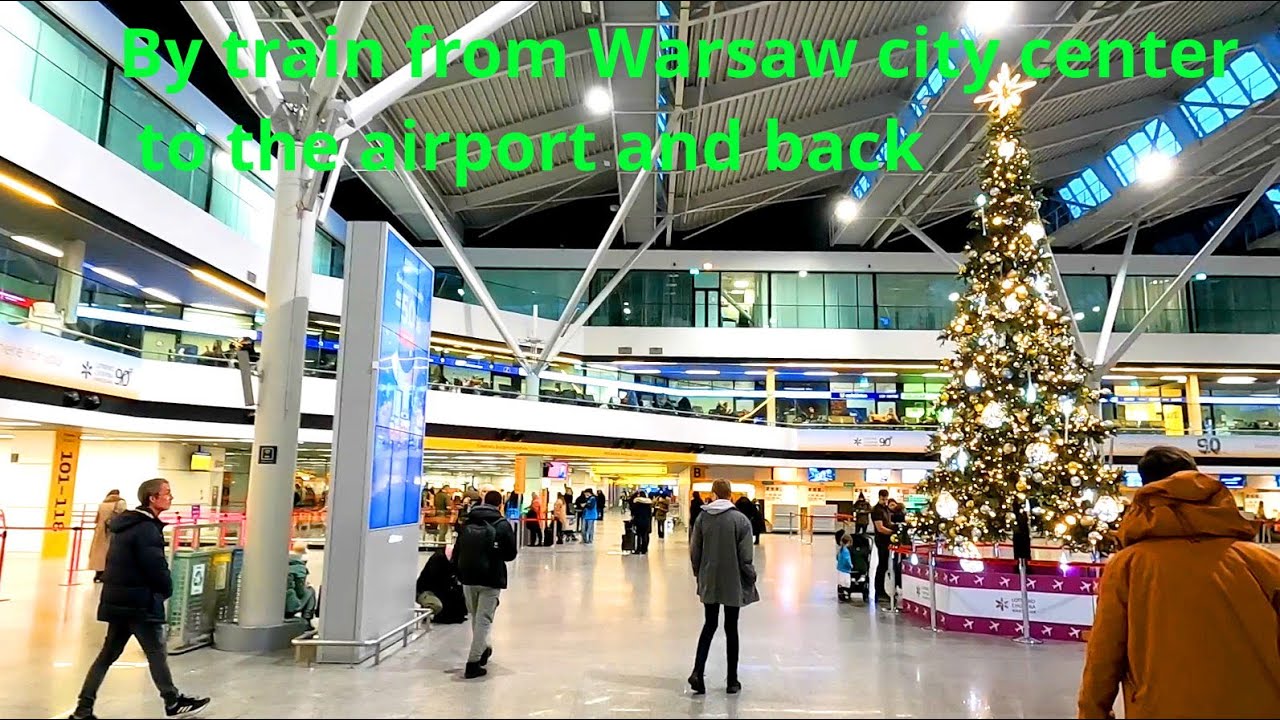 By train from Warsaw city center to the airport and back, Poland 20250101