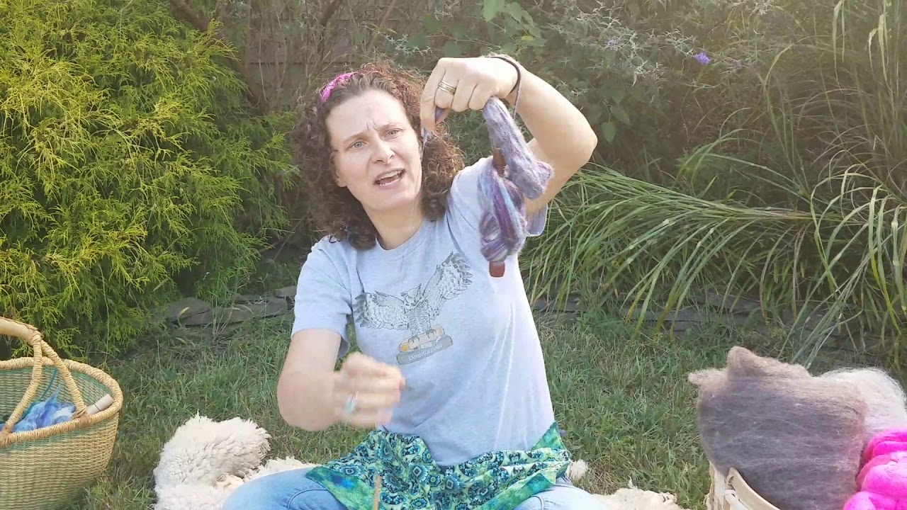 Dressing and spinning with a wrist distaff