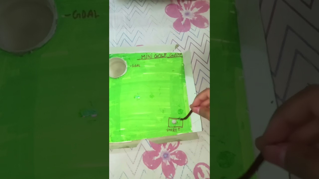 mini golf game homemade with cardboard