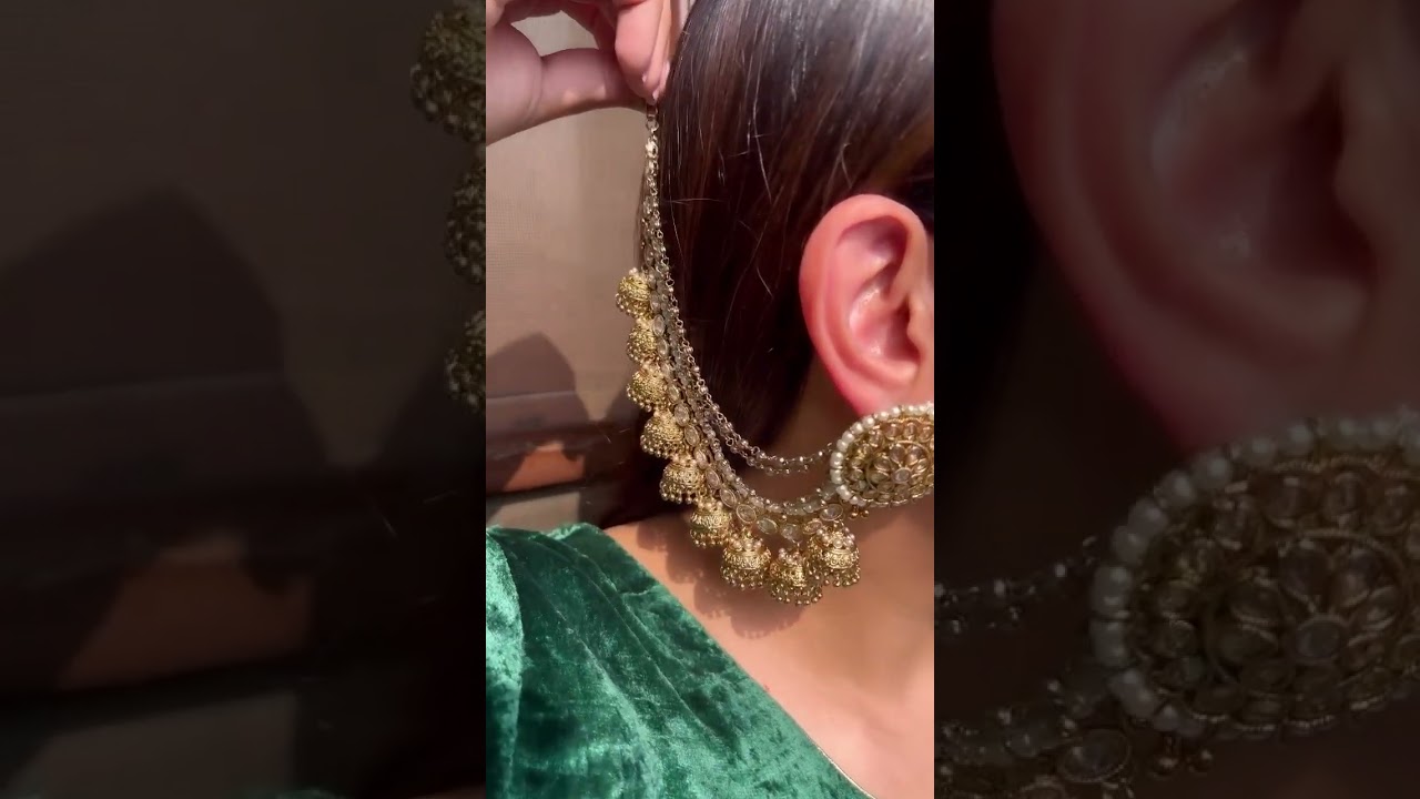 An ornate ear chain with a stud earrings is what makes The Nivika unique!