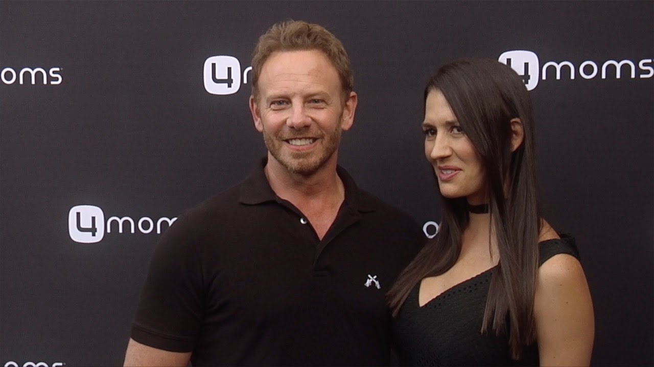 Ian Ziering & Erin Kristine Ludwig 4moms Self-Installing Car Seat Launch Black Carpet