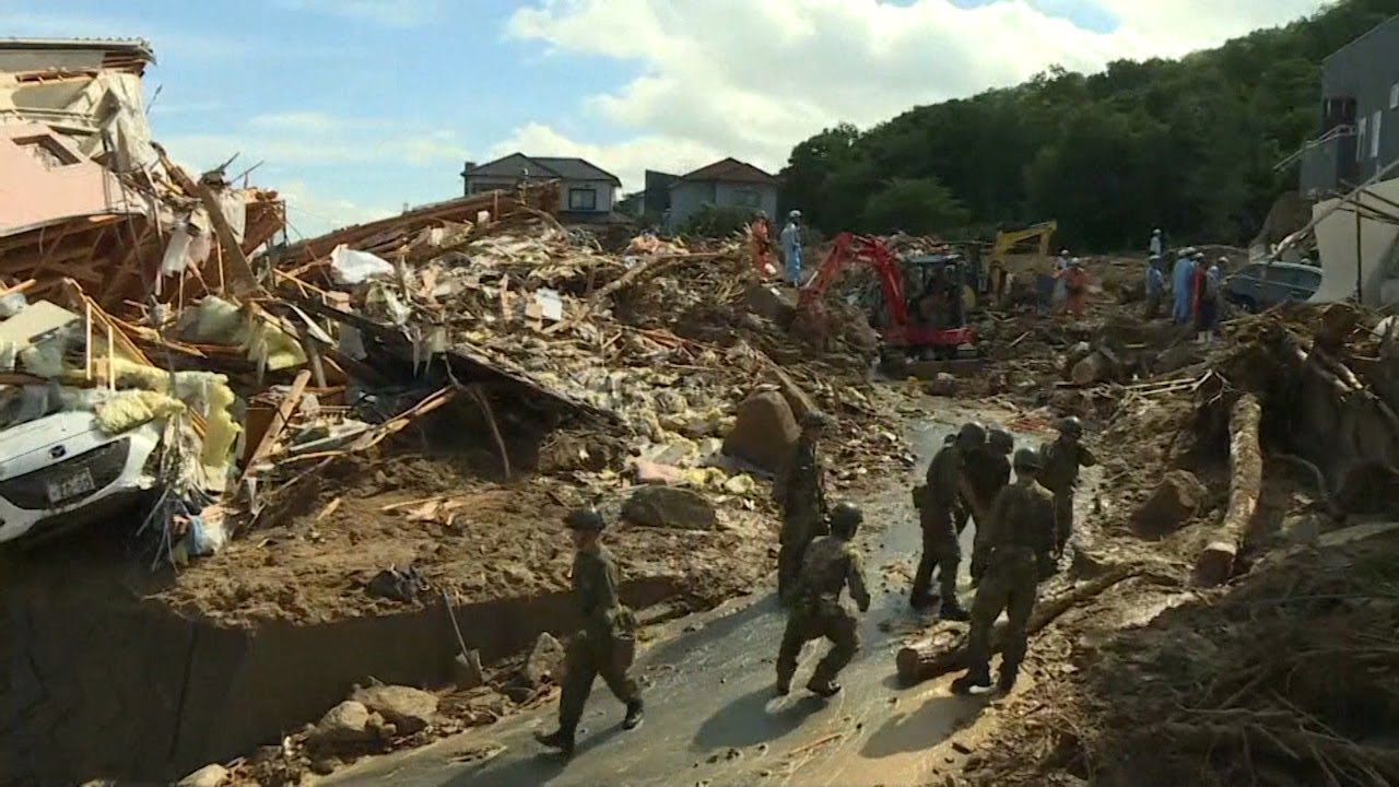 Landslide warnings as Japan digs through rain devastation