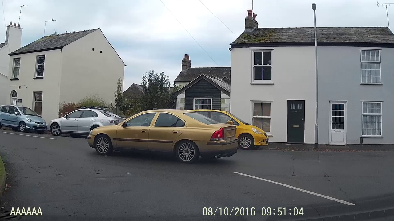 Cambs Dashcam - Ely, Cambridgeshire: Volvo pulls out after seeing a vehicle is oncoming.