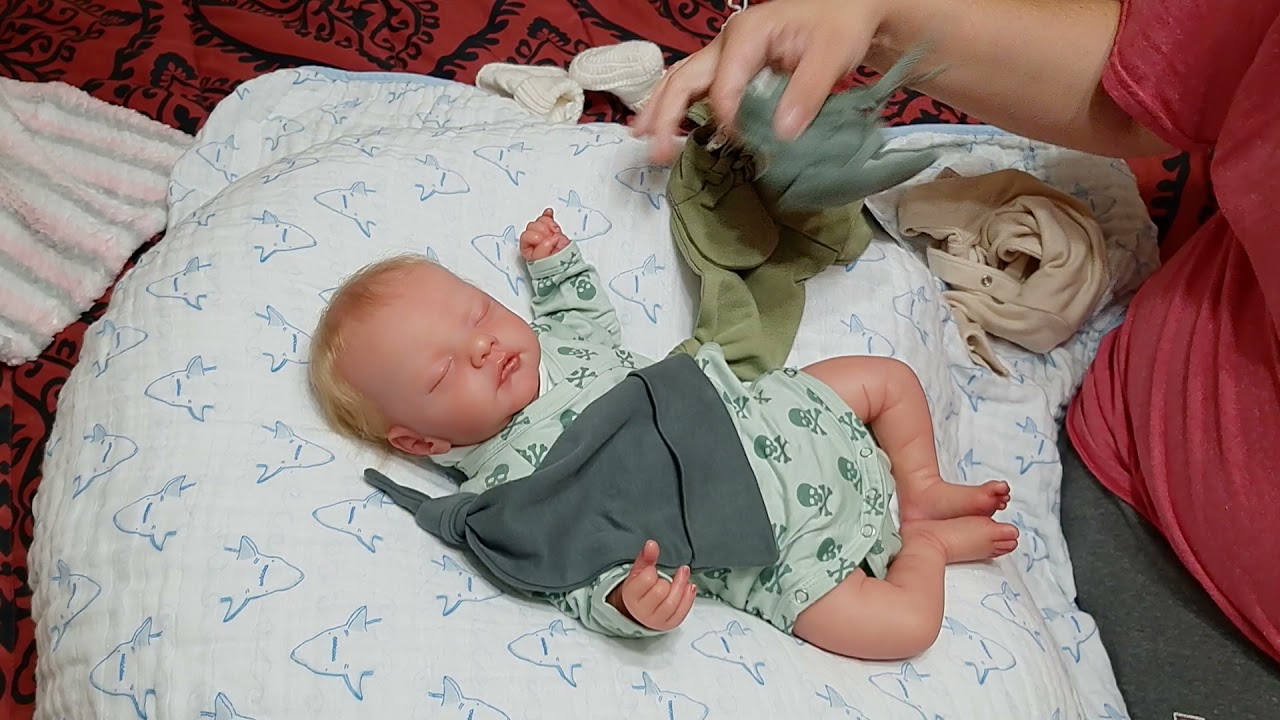 Changing reborn baby Sam