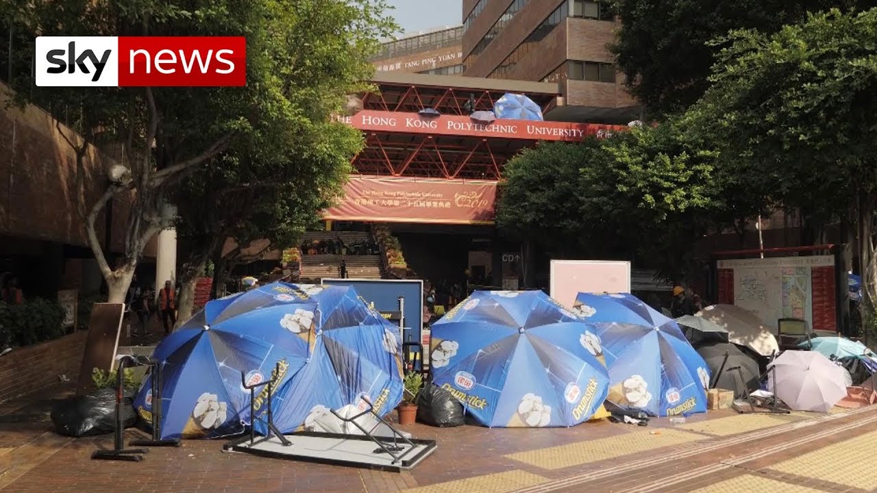 Hong Kong students battle with police