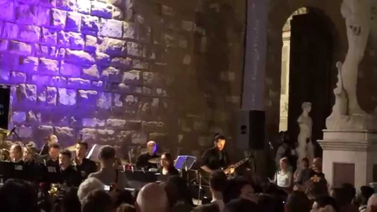 Sultans Of Swing by orchestra in Florence