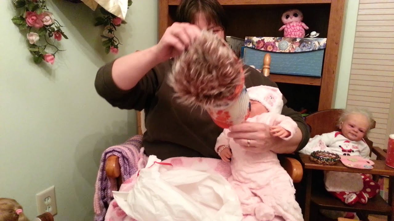Kathy opens her Christmas present!