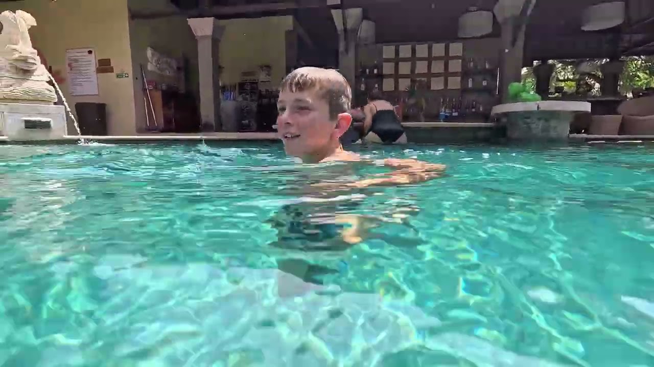 Swimming at Adhi Jaya Hotel, Bali