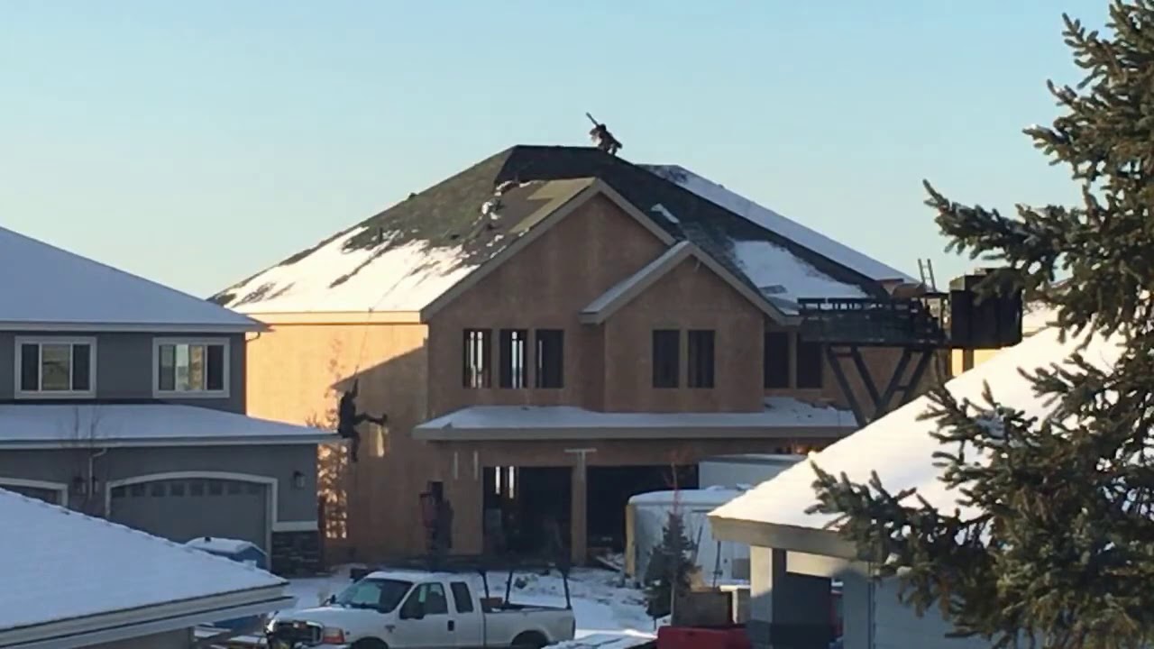 Alaskan Roofer Takes A Fall - Dangerous Winter Job