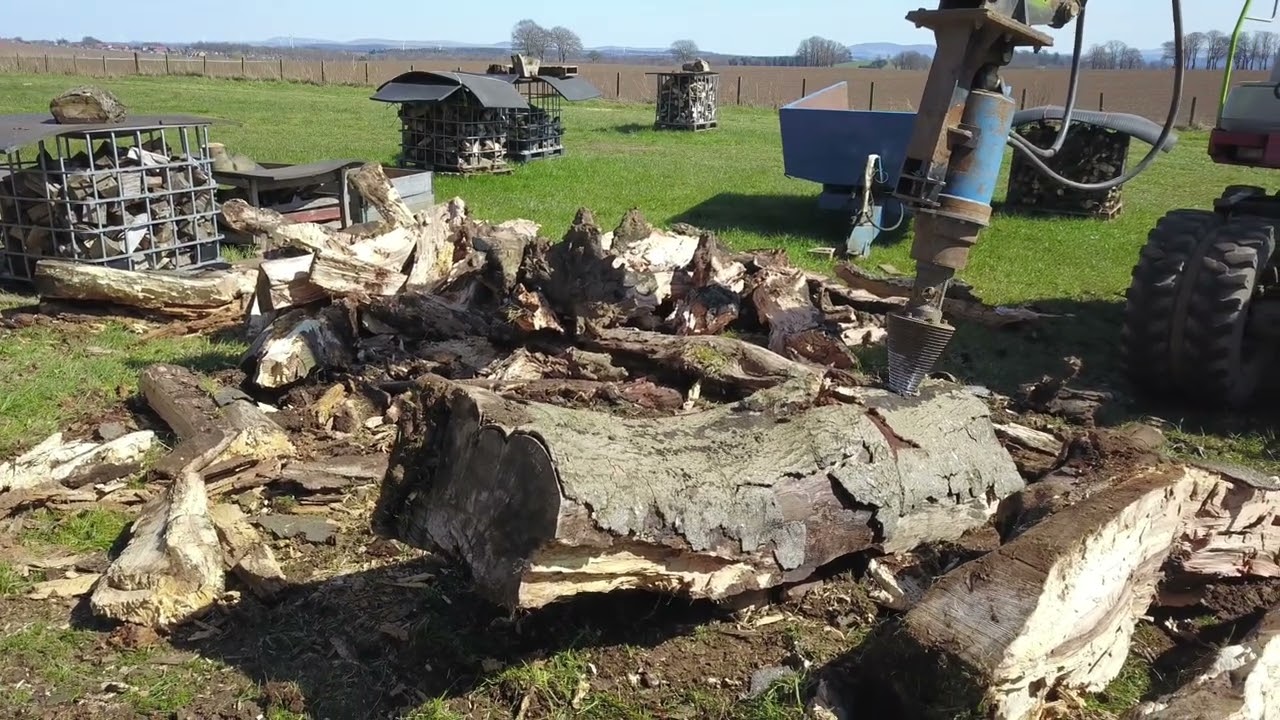 Log Splitter Auger Cone In Action - Raw Footage | The Attachment Company