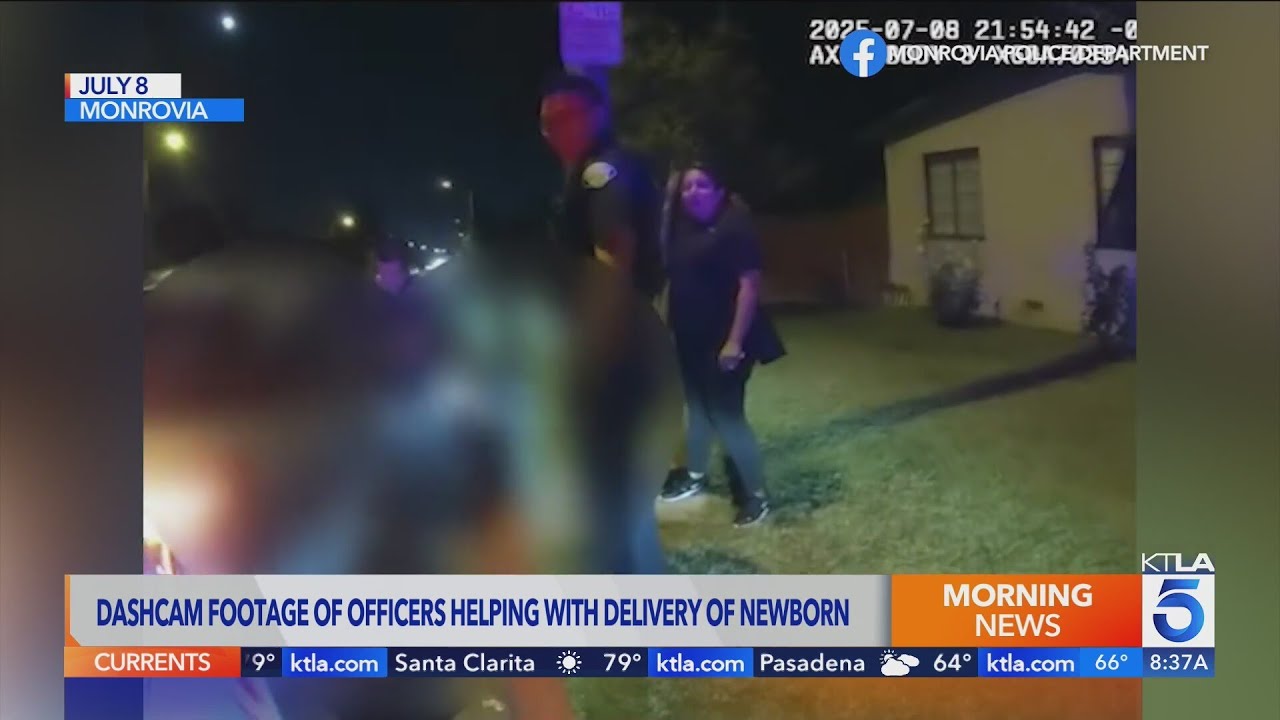 Dashcam footage of officers helping with roadside birth