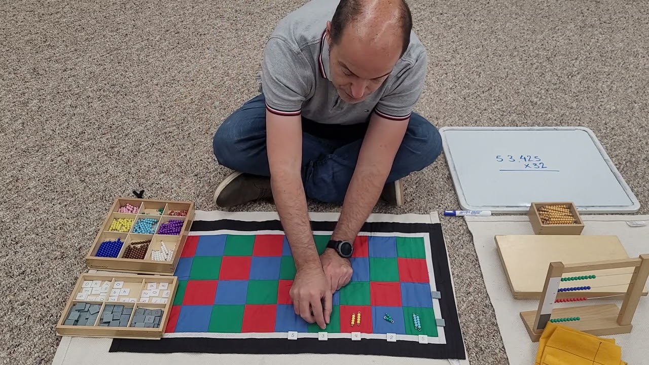 Multiplicación de dos digitos utilizando el ajedrezado de Montessori (En español)