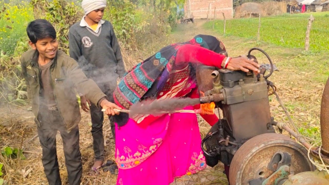 देखिए ठंड के मौसम में इंजन को आग दिखाकर चलाया इस महिला ने #DieselEingin #Machine #WaterPump