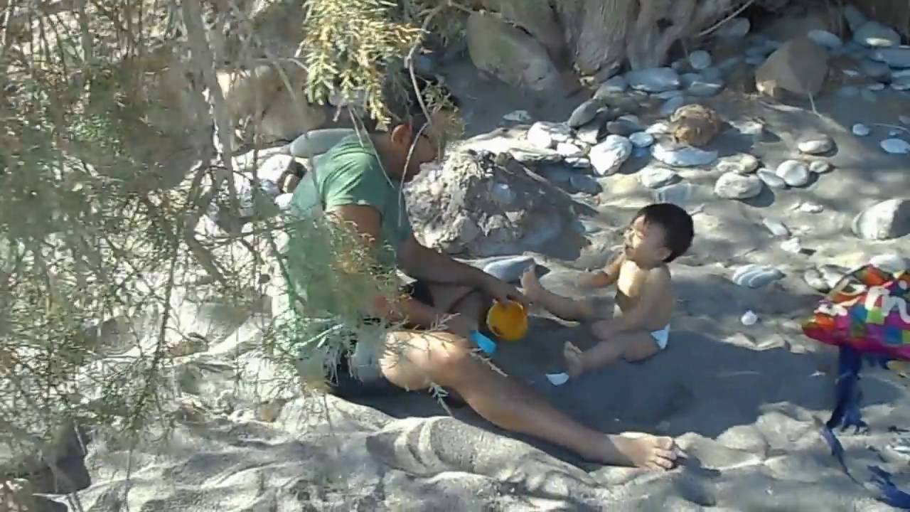 Baby eating sand funny video