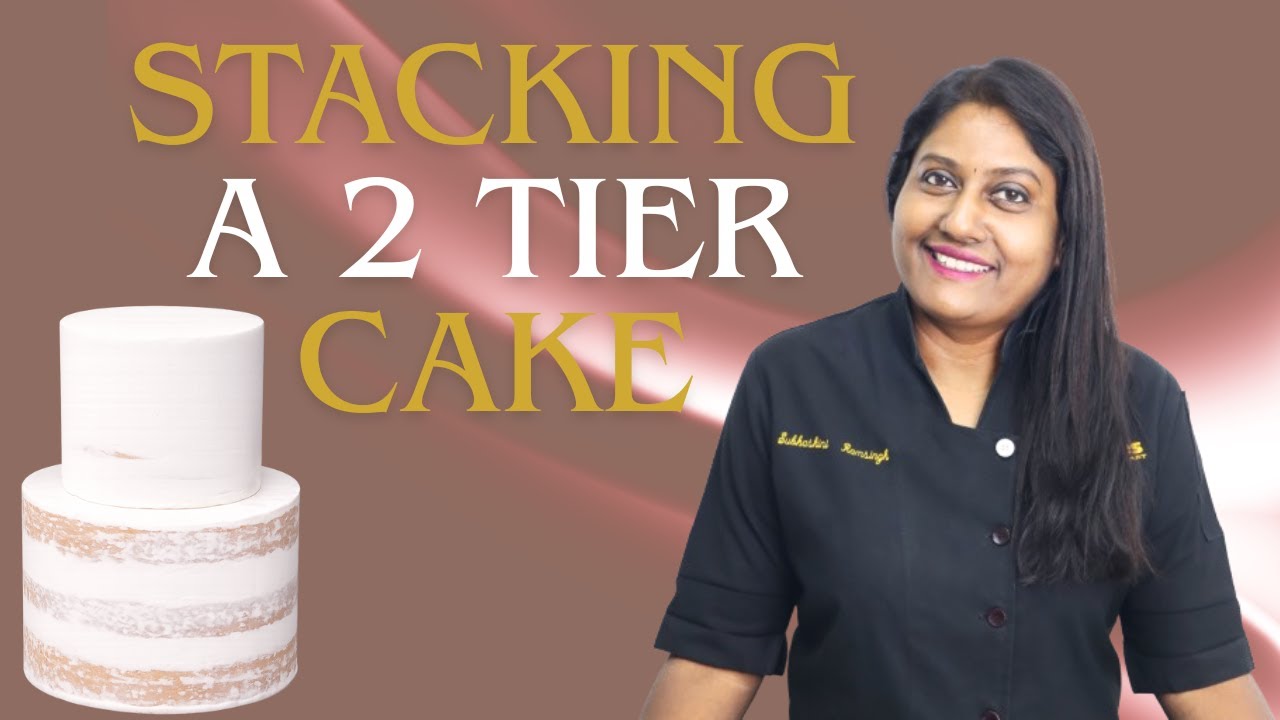 Stacking a 2 Tier Cake #cakestacking #tieredcake #cakedecorating #weddingcakes #fondbites