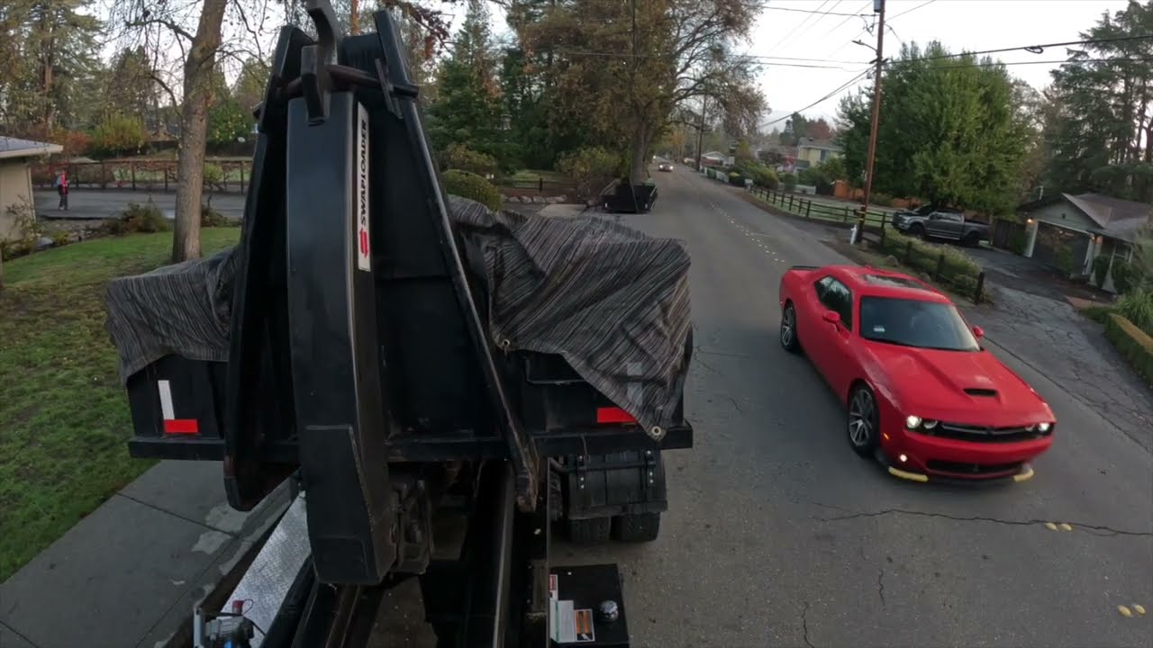 Hooklift Truck Driver At Its Finest!