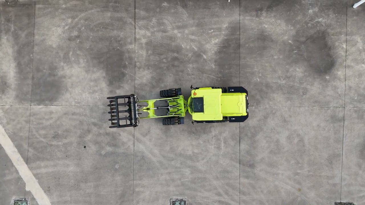 Electric Compact Wheel Loader From a High Angle Shot
