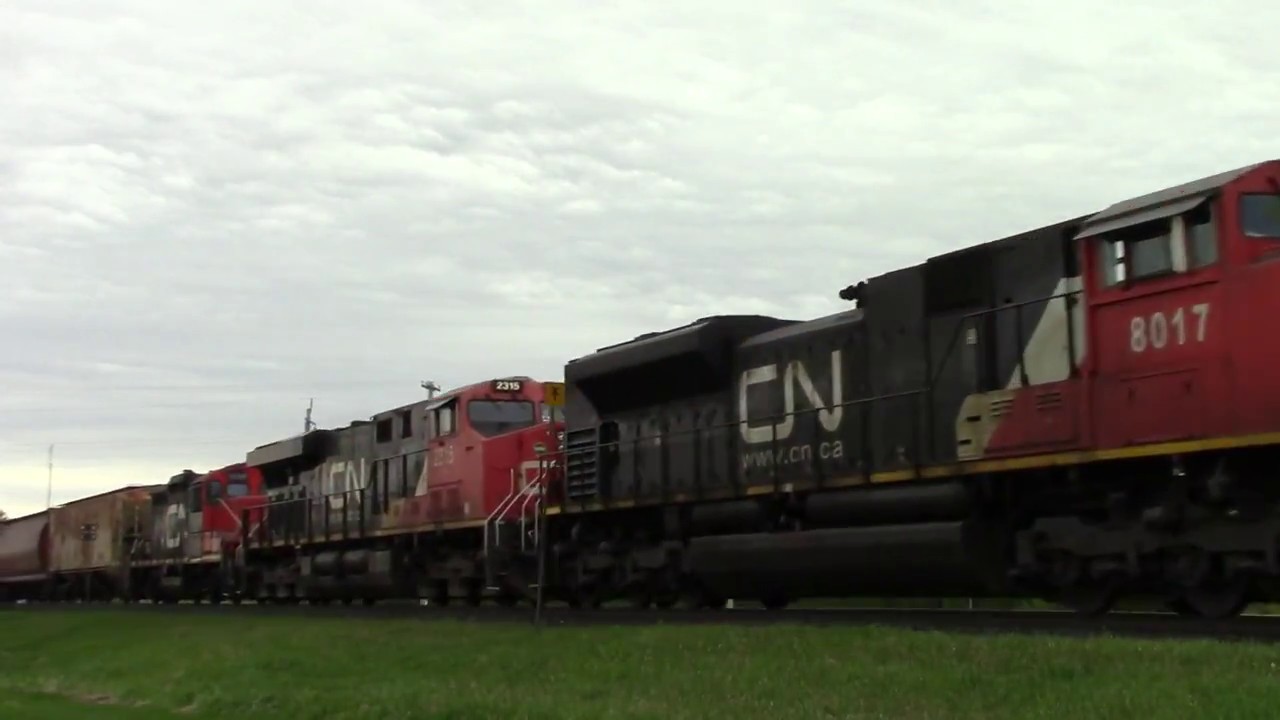 CN GP9 helping two ES44dc and an SD70m2