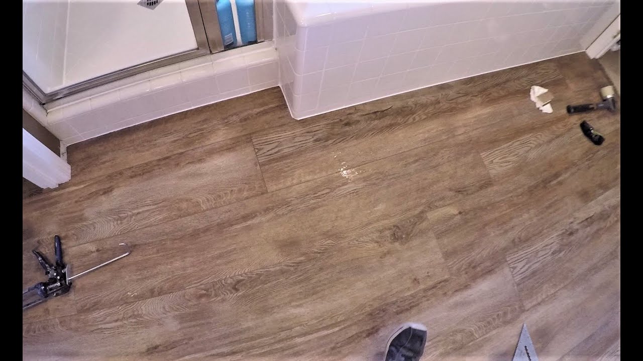 How to Install Rigid Core Vinyl Plank Flooring | Against Tub & Shower | Step by Step