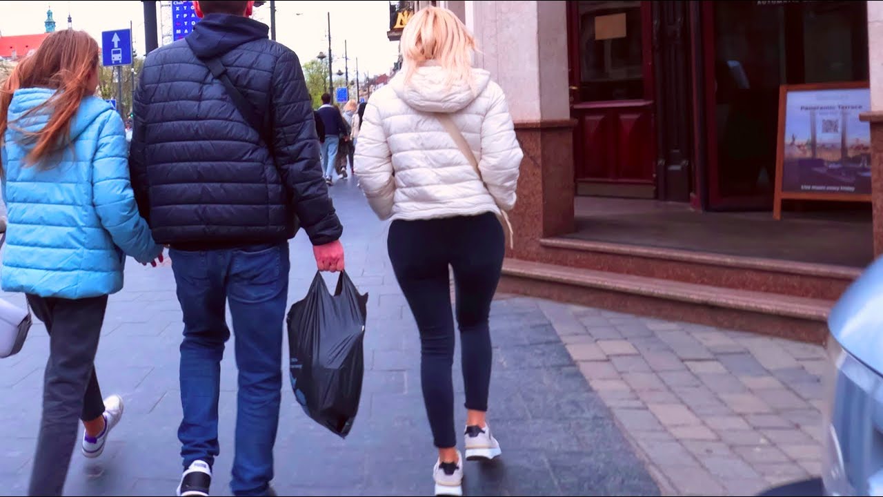 HOT Blonde  Takes a Walk in the City in Black Leggings