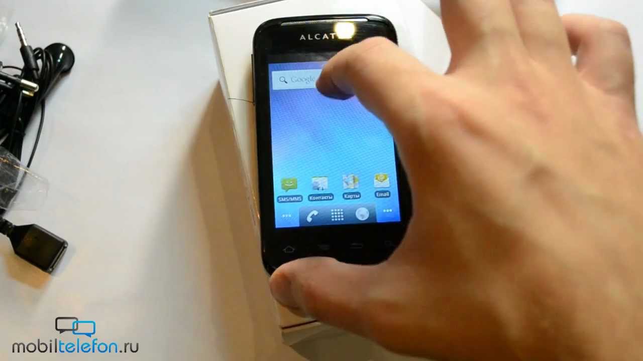 Распаковка Alcatel One Touch 983 (unboxing)