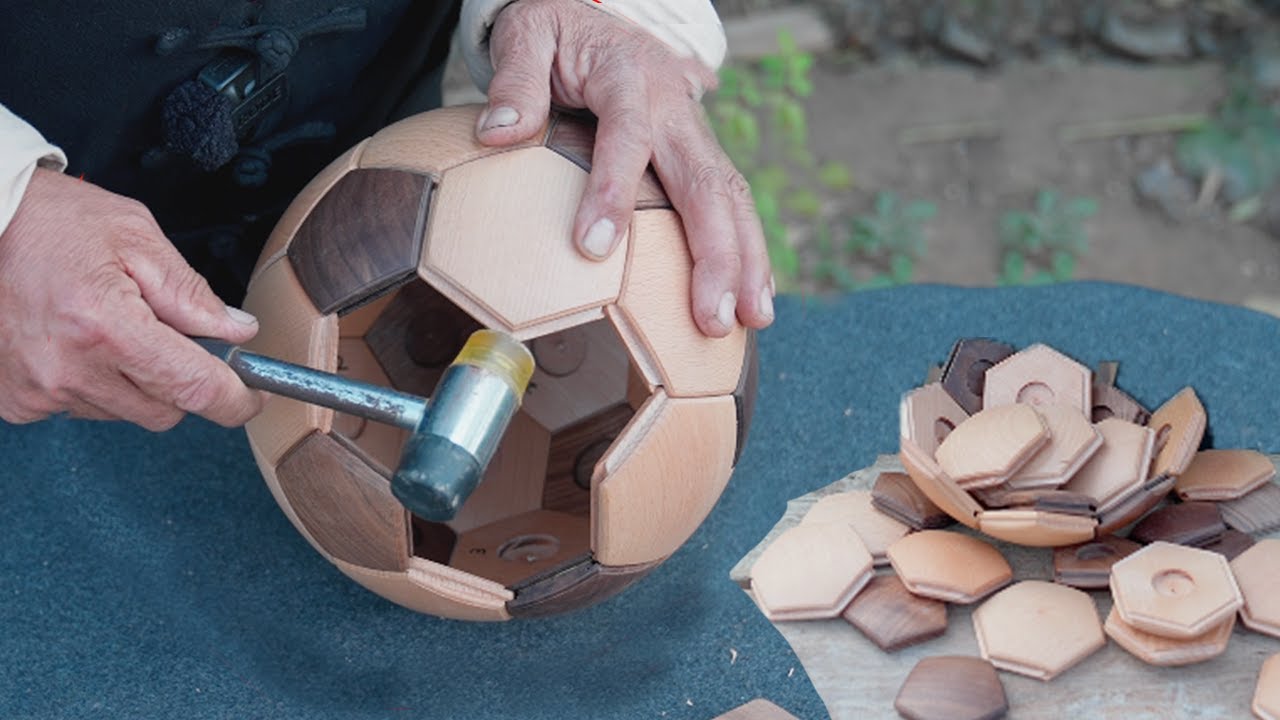 Chinese Master Carpenter assembles soccer balls out of wood.Wood Structure Connectors Joints#Wood