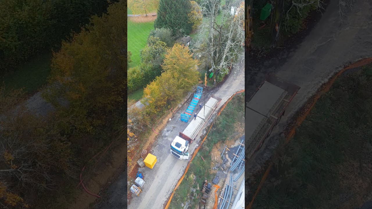 déchargement préfabriqués béton 4,5T. en bout de flèche.limite.