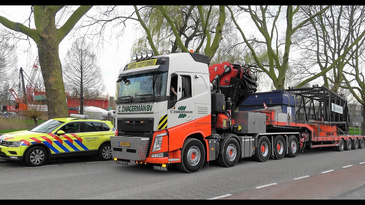 Trucks, buses and a crane in Ridderkerk, NL,  16 MAR 2020