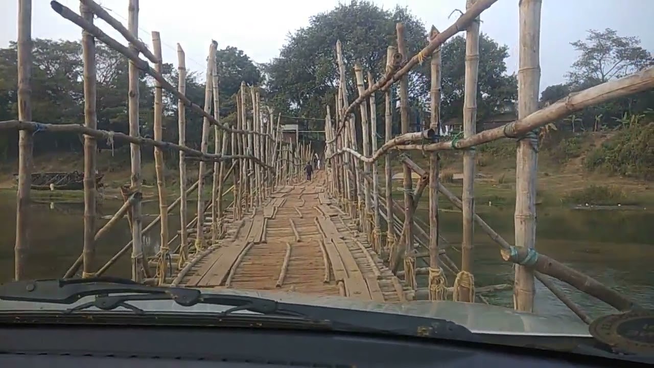 A most dangerous riding over a narrow wooden bridge...!!