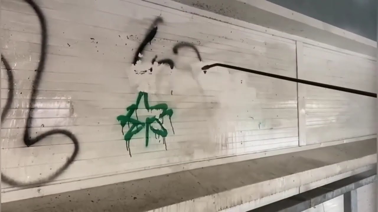 GRAFFITI REMOVAL AT CAR PARK
