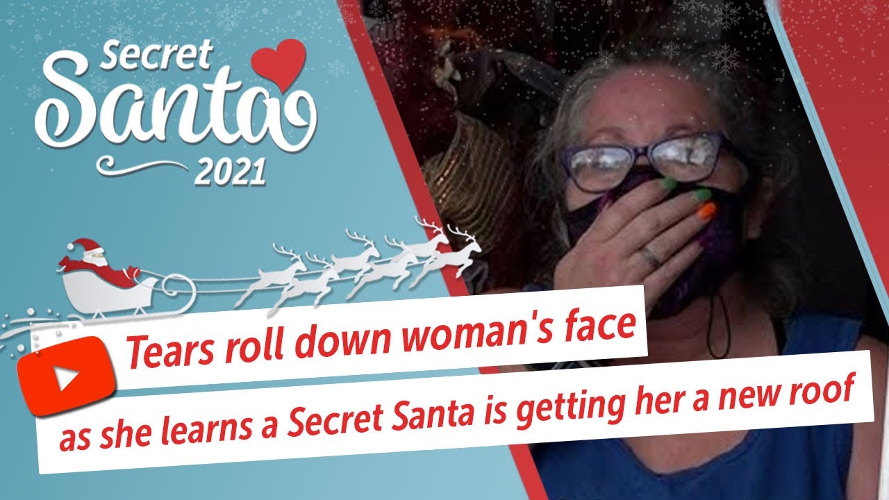 Tears roll down woman's face as she learns a Secret Santa is getting her a new roof
