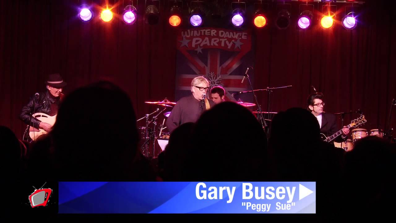 Gary Busey sings 