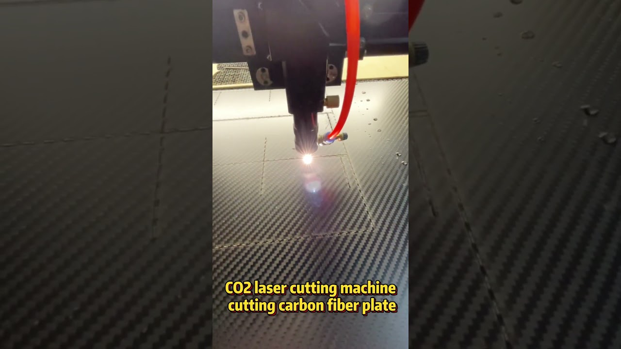 CO2 laser cutting machine cutting carbon fiber plate 
