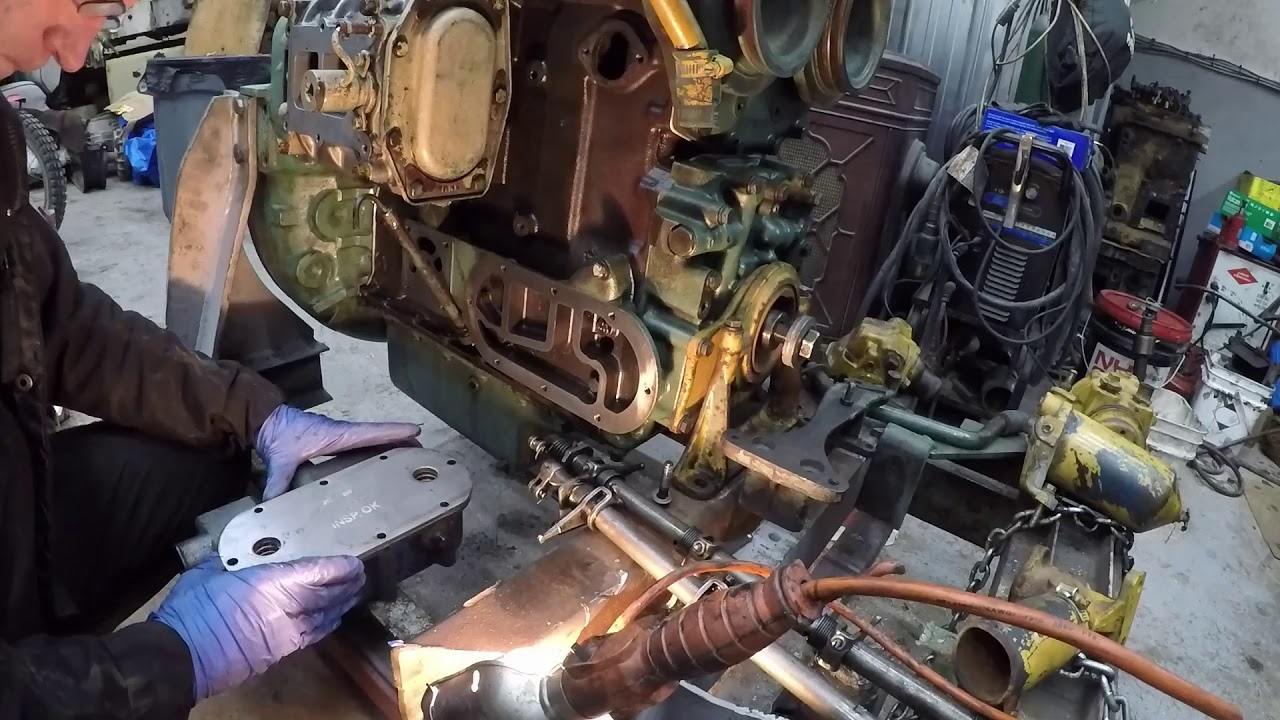 Detroit 3-53T Installing Oil Cooler, Water Pump and Thermostat Housing
