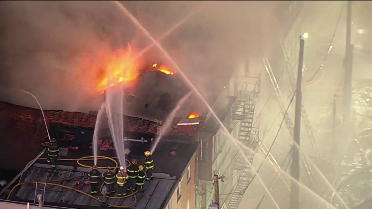 100 firefighters battle massive building fire in North Philly