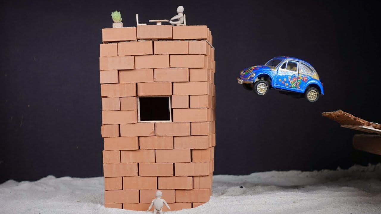 Toy Car Crashing into a Brick Tower (Slow Motion)