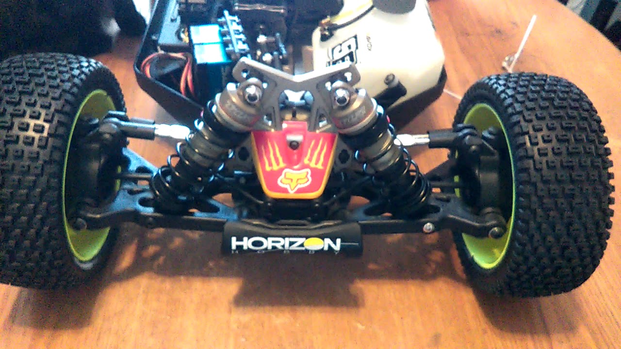 Losi 5B buggy kit motor and exhaust pipe completion number 7 video.